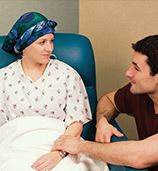 patient in gown with caregiver